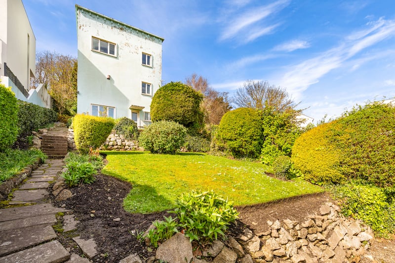 The expansive tiered back garden extends to about 25m (85ft)