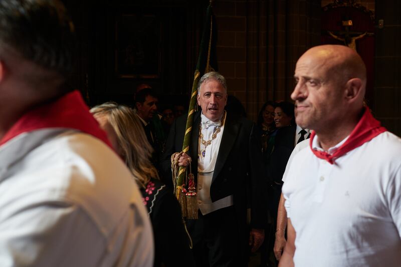 Pamplona mayor Joseba Asirón with the city's flag after the procession of San Fermín last July. The event was marked by protests and has become a scene of political tension. Photograph: Eduardo Sanz/Europa Press via Getty Images