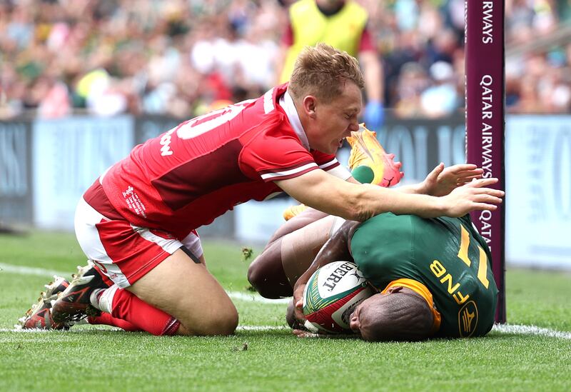 Makazole Mapimpi of South Africa scores against Wales. Photograph: Warren Little/Getty Images