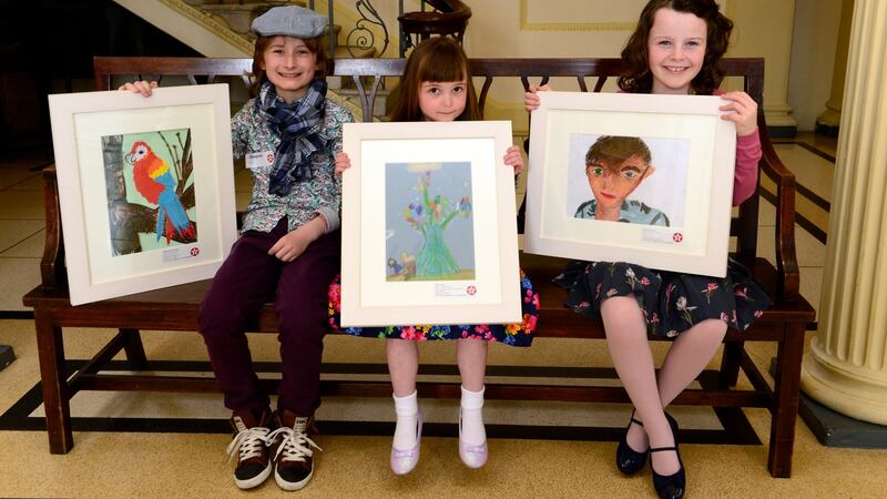 From left, Deaghlan McGovern from Dundalk,   Elle Giblin of Glasnevin and Eimear Donovan from Caherconlish, Co Limerick, winners  in the Texaco Children’s Art Competition 2016. Photograph: Cyril Byrne/The Irish Times
