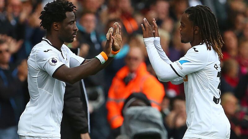 Wilfried Bony replaces Renato Sanches during Swansea City’s defeat to Newcastle. Photograph: Geoff Caddick/AFP