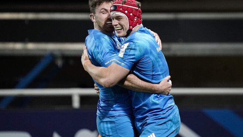 Leinster’s Josh Van der Flier celebrates with Hugo Keenan after scoring a try in the Heineken Champions Cup game against Montpellier at the GGL stadium. Photograph: Dave Winter/Inpho