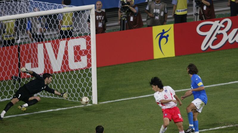 Jung Hwan Ahn  heads past Gianluigi Buffon to send South Korea into dreamland in 2002. Photo: Gary M. Prior/Getty Images