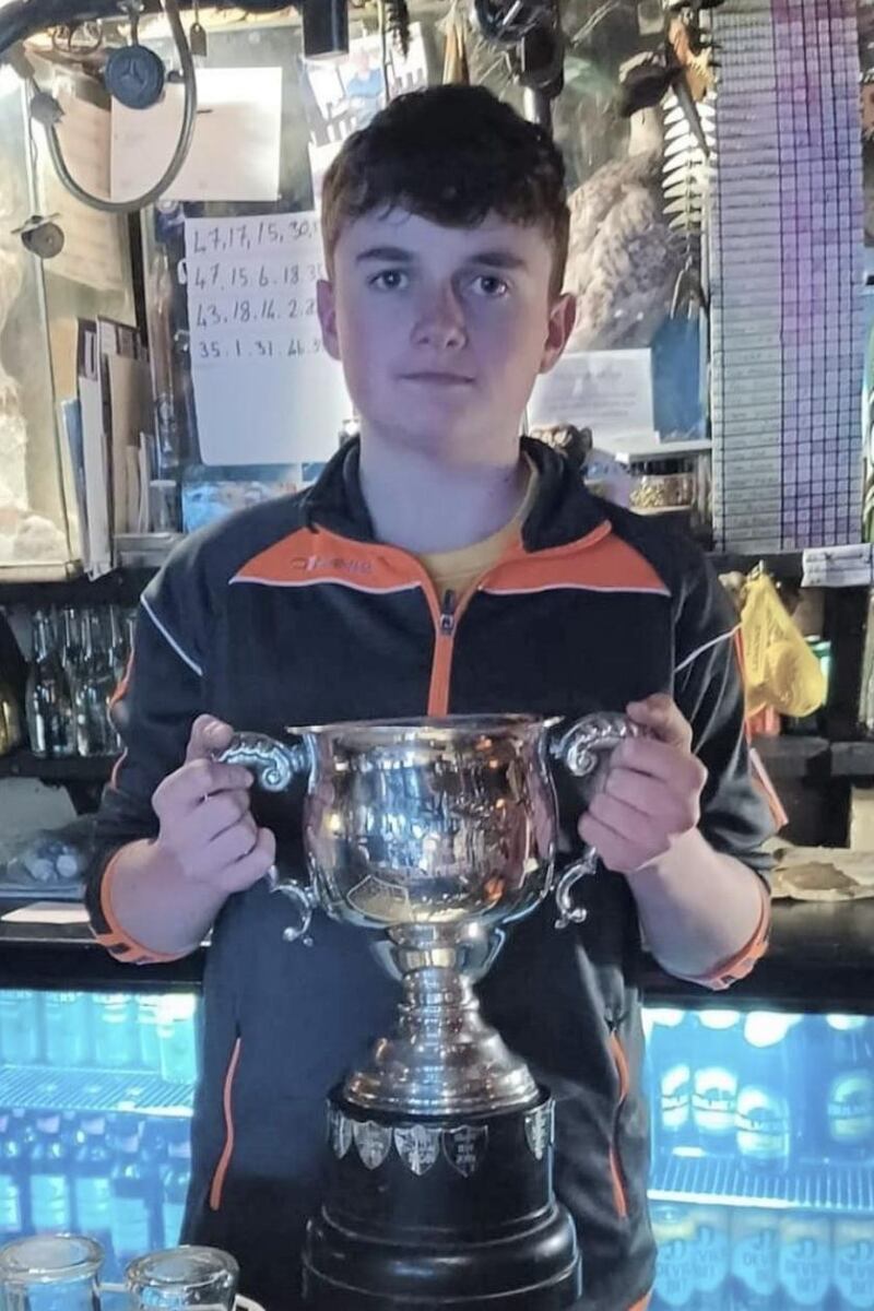 Darren Sweeney (17) with the youth river trout championships cup, following his win on the Anner River