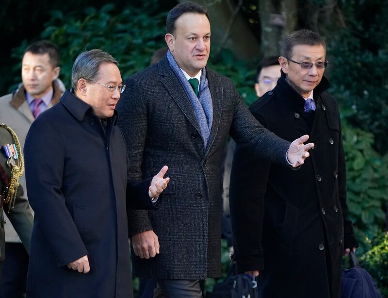 Taoiseach Leo Varadkar walks with Chinese premier Li Qiang (left), at
Farmleigh House in Dublin. Photograph: Niall Carson/PA Wire