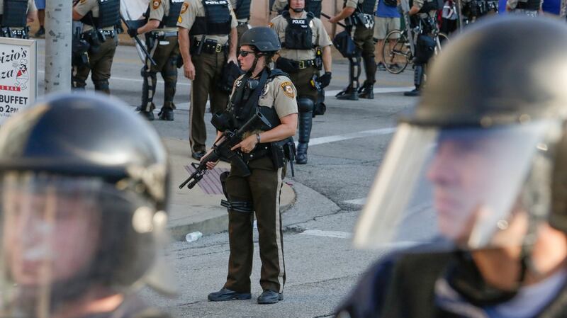 St Louis Police Department officers  on the street in riot gear after a not-guilty verdict in the murder trial of Jason Stockley, a former St Louis police officer, charged with the 2011 shooting of Anthony Lamar Smith, who was black, in St Louis, Missouri, US. Photograph: Lawrence Bryant/Reuters
