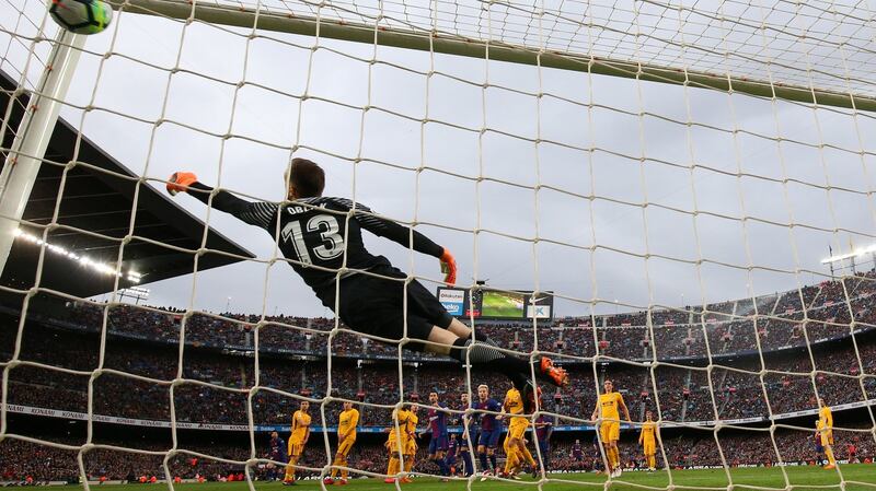 Lionel Messi scores the game’s only goal via a first half free kick. Photograph: Reuters