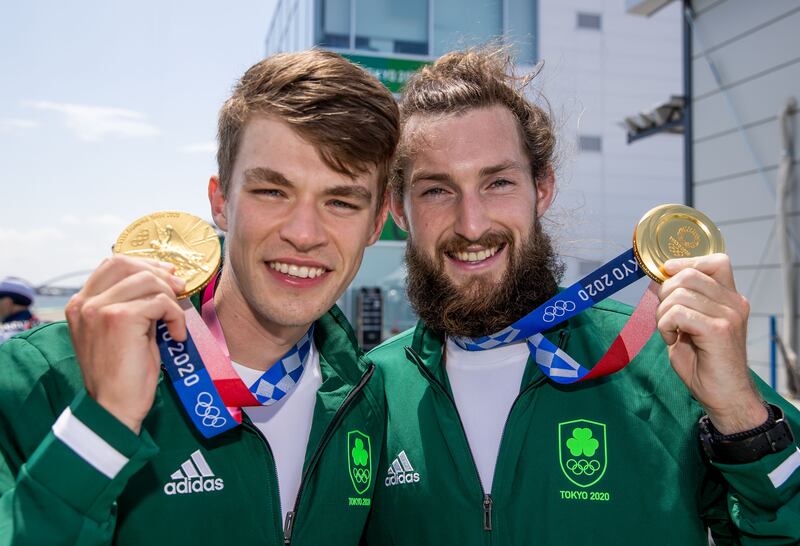 Fintan McCarthy (left) and Paul O’Donovan with their gold medals at the Tokyo Olympics. Photograph: Morgan Treacy/Inpho