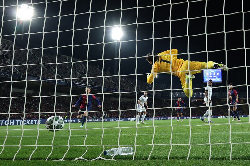 Inter Milan's Swiss goalkeeper Yann Sommer scores an own goal after Raphina's spectacular shot hits the crosbar but rebounds off the goalkeeper's back for a Barcelona leveller. Photograph: Luis Gene /AFP