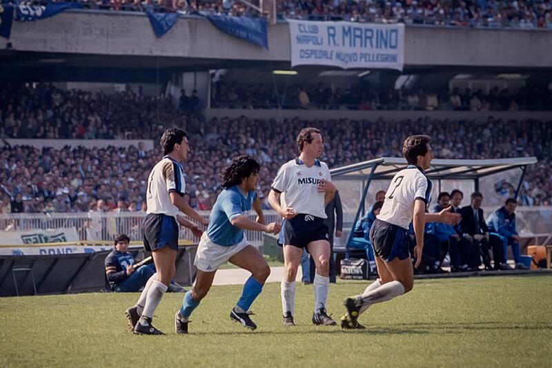 Bringing it all back home: Diego Maradona tries to escape the attention of Liam Brady during a Napoli-Inter Milan clash in 1985. Photograph: Stefano Montesi - Corbis/Corbis via Getty Images