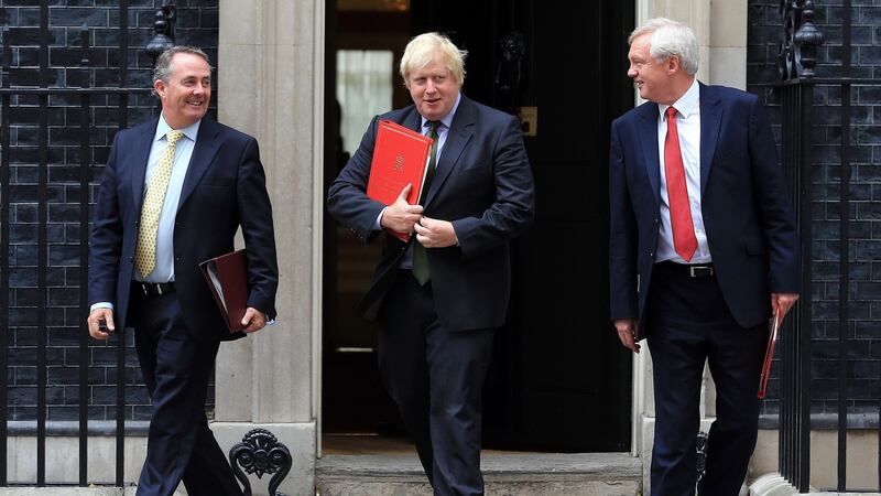 International Trade Secretary Liam Fox, Boris Johnson and David Davis. Photograph: Gareth Fuller/PA Wire