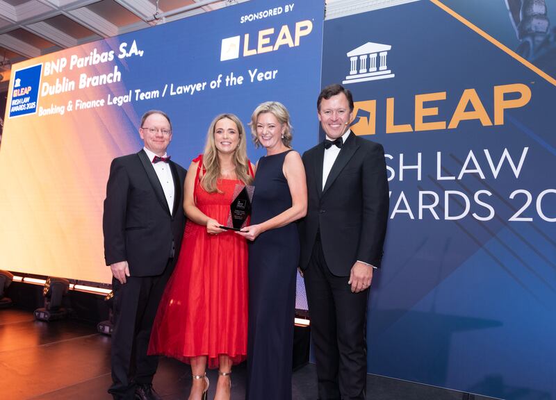 Richard Hammond, solicitor and partner at Hammond Good LLP and chair of the judging panel of the Leap Irish Law Awards; Alannah Shortt, legal counsel at BNP Paribas; Nicola Curray, head of legal Ireland, BNP Paribas; and Anton Savage, MC of the night. Photograph: Paul Sherwood