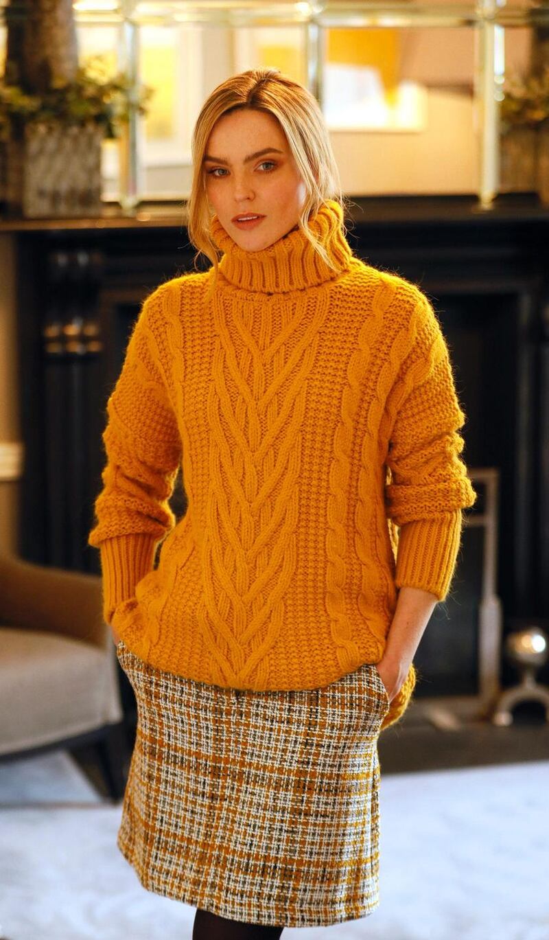 This chunky knit sweater can be had for €47.50, while the tweed skirt is €49. Photograph: Kieron Harnett