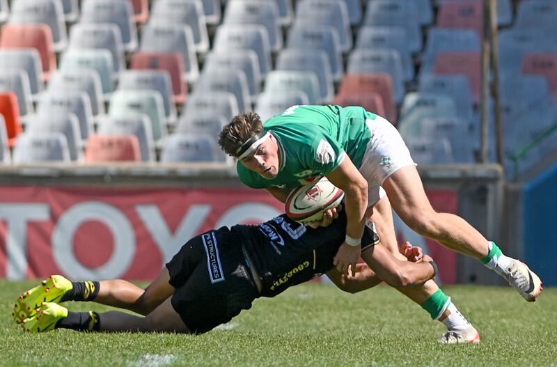 Jude Postlethwaite of Emerging Ireland is tackled during the game against Western Force. Photograph: Darren Stewart/Inpho/Steve Haag Sports