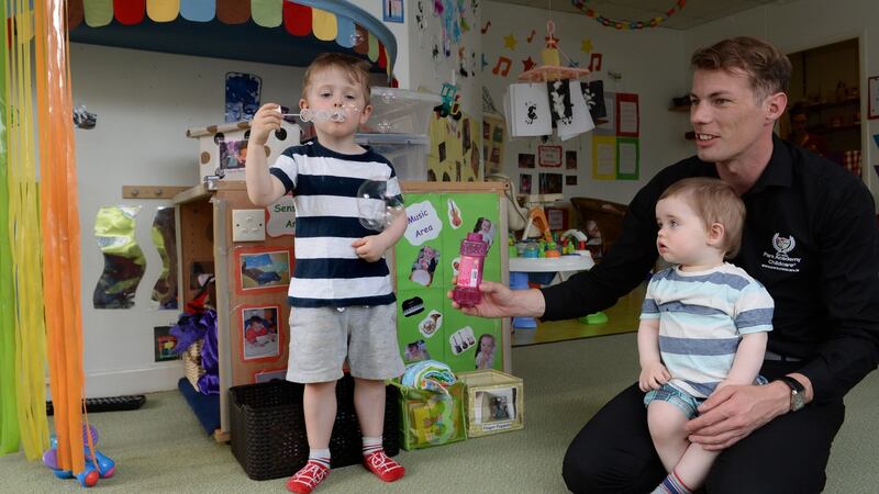 David Kenna, junior manager at the Park Academy Childcare, with Bobby Smith and Dara Corduff. Photograph: Cyril Byrne