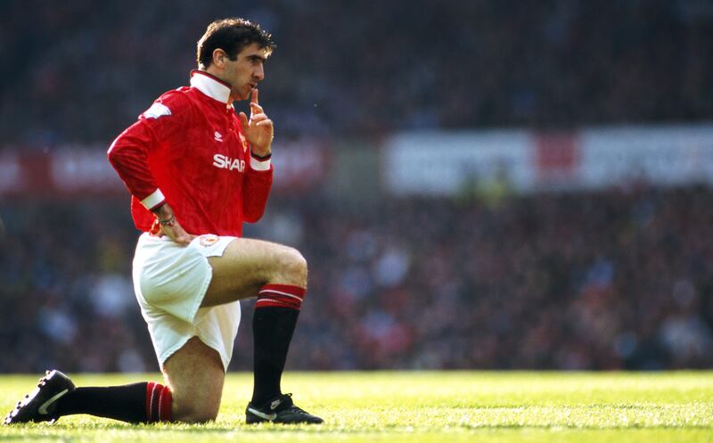 Manchester United striker Eric Cantona reacts during a Premier League match against Manchester City at Old Trafford on April 23rd, 1993. United won the game 2-0 with both goals scored by Cantona. Photograph: Anton Want/Allsport/Getty Images