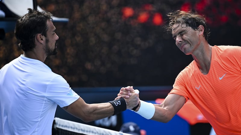 Rafael Nadal of Spain is congratulated by Fabio Fognini after their quarter-final clash. Photograph: Dean Lewis/EPA