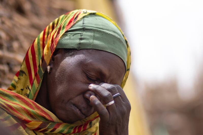 Rugia Ibrahim Abdallah cries as she speaks about the RSF coming to her neighbourhood and taking her three sons away in a truck. A few days later Rugia’s aunt found their bodies in a dry stream. 
