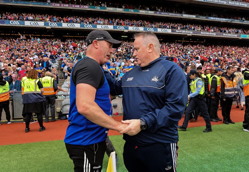 Tipperary manager Liam Cahill is congratulated by Cork counterpart Pat Ryan after the All-Ireland SHC final at Croke Park. Photograph: Bryan Keane/Inpho