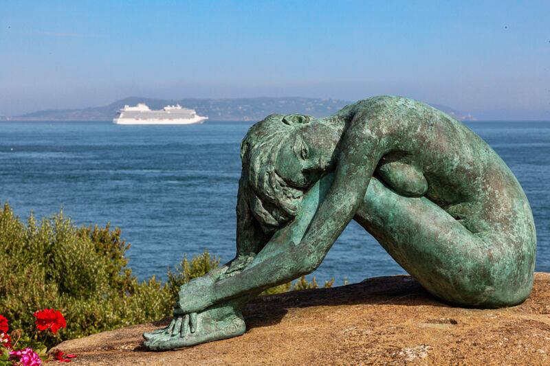 Rebecca, a life-size sculpture by David Williams Ellis at the end of the garden, which is included in the sale