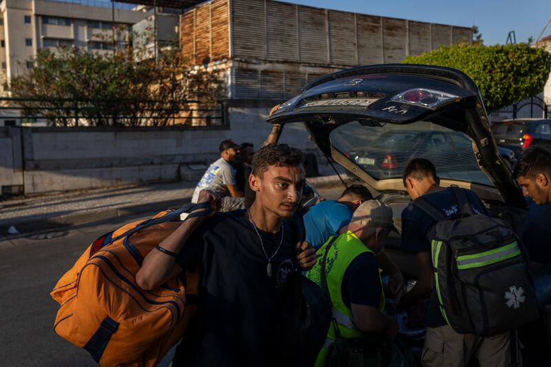 Residents displaced from southern Lebanon arriving at the Technical School of Bir Hassan in Beirut, Lebanon. Photograph: Diego Ibarra Sanchez/New York Times