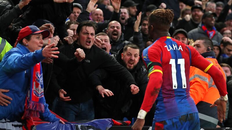 Wilfried Zaha celebrates after bagging a late equasliser for Palace. Photo: Daniel Leal-Olivas/Getty Images