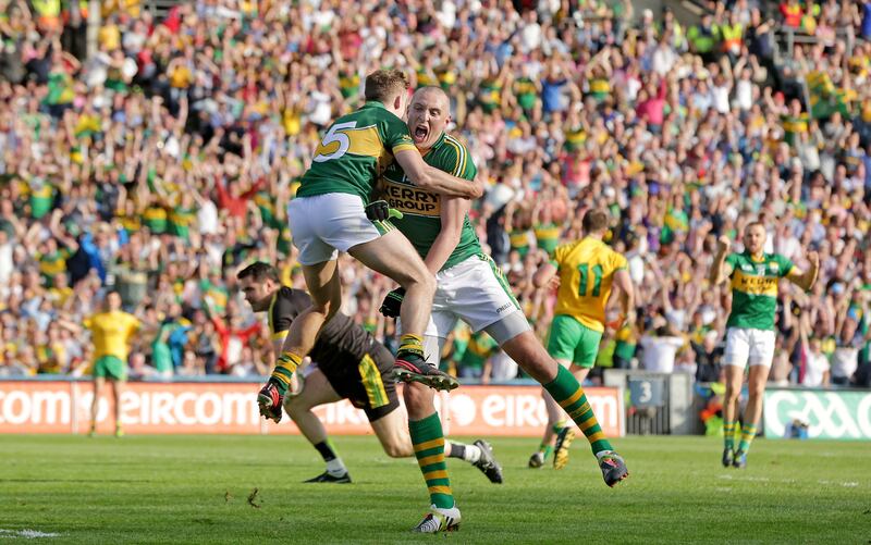 Kerry's Kieran Donaghy celebrates scoring a goal with James O’Donoghue during the 2014 All-Ireland final against Donegal. Photograph: Morgan Treacy/Inpho