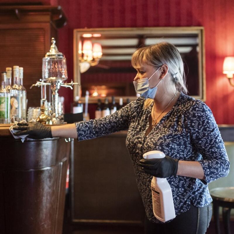 New normal: Covid-19 precautions include sanitising restaurants regularly. Photograph: Ennio Leanza/EPA