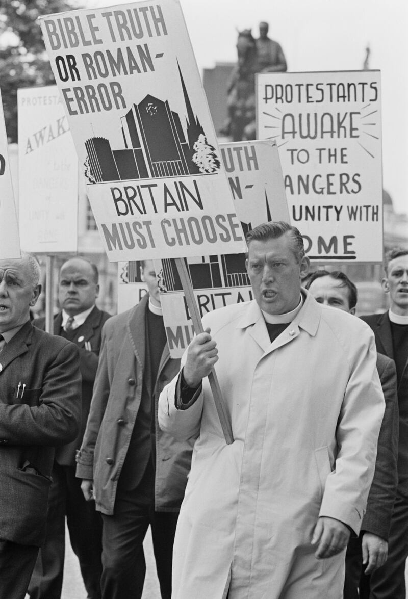 Ian Paisley  leads an anti-Catholic demonstration from Trafalgar Square to Downing Street, London in 1967. Photograph: John Downing/Express/Hulton Archive/Getty Images