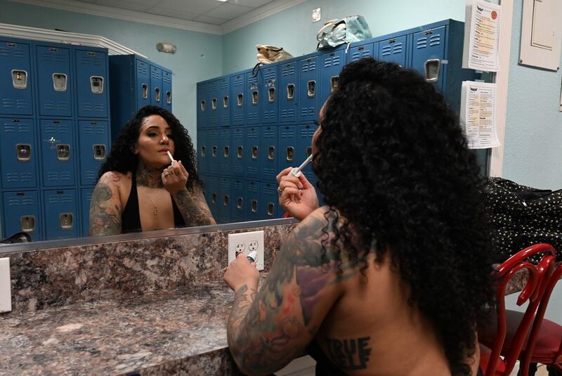 #StripTok: Teauryajya DuBenion prepares backstage at the Red Leopard. Photograph: Todd Anderson/New York Times