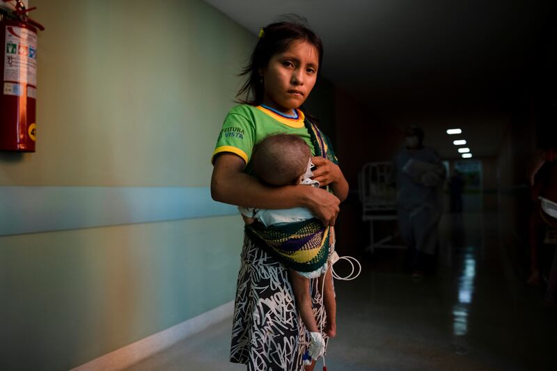 A Yanomami mother with her baby at a children’s hospital in Boa Vista, Brazil in February. Photograph: Victor Moriyama/The New York Times