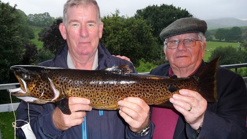 Pat Gallagher (left), winner of heaviest trout at vintner’s competition, with Ciarán Burke. The fish weighed 3.434kg.