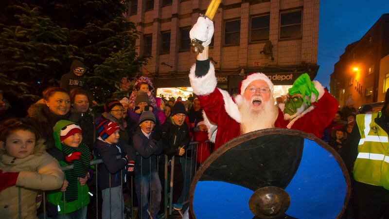 Santa arrived in Waterford on horse drawn sleigh flanked by some Star Wars cast members (and the Grinch). Photograph: Patrick Browne