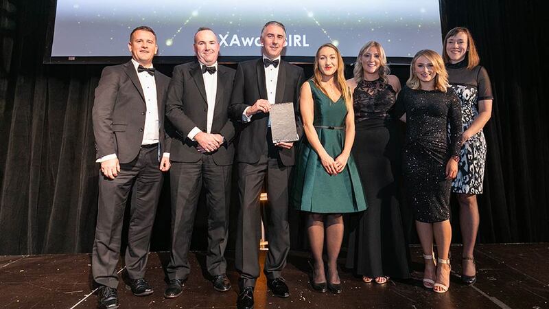 Agnieszka Anna Jozwiak , Awards Judging Co-ordinator & CXPA presents the Best Use of Data Analytics in CX award to the AIB team.