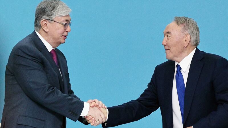 Former Kazakh president Nursultan Nazarbayev and his successor President Kassym-Jomart Tokayev. Photograph: Stanislav Filippov/AFP via Getty Images