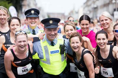 Women’s Mini Marathon: Garda Martin Mooney with Clonliffe Harriers runners at the 2018 race. Photograph: Tom Honan
