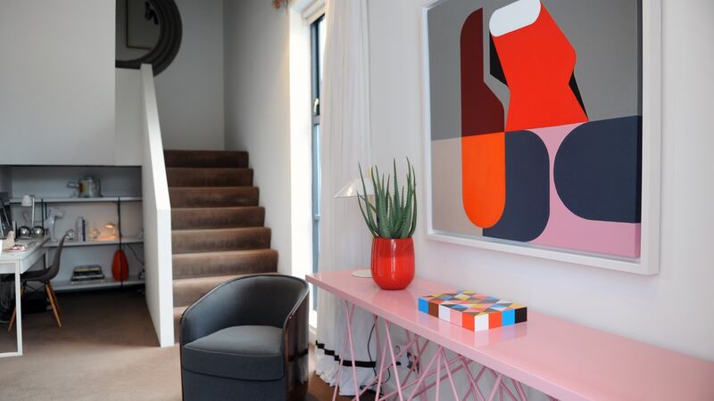 Hall table made by John Redmond and a bucket chair bought in a flea market in Paris. Photograph: Aidan Crawley