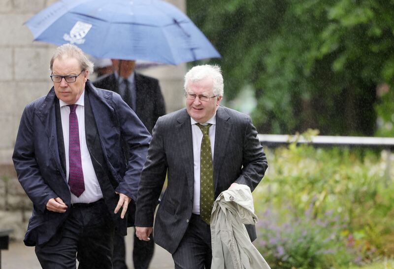 Supreme Court justices Maurice Collins and Séamus Woulfe. 