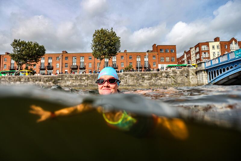 Mary Carpenter savours the Liffey water just before she the start at Rory O'Moore Bridge. 
Photograph: Bryan Keane / Inpho