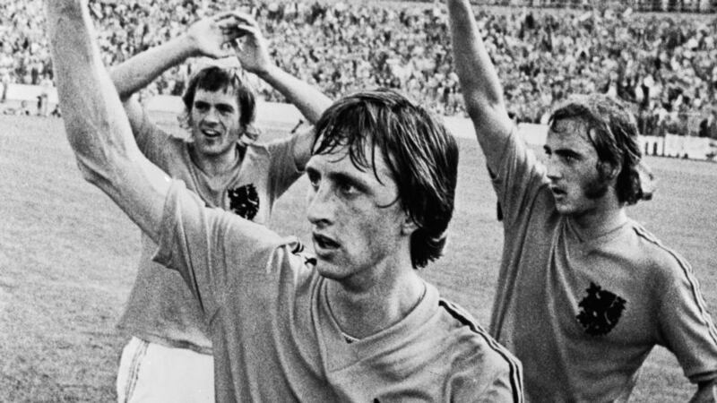 Dutch footballers (from left) Johnny Rep, Johan Cruyff, and Johan Neeskens wave to the crowd before taking on West Germany in the 1974 World Cup Final. Photograph: Getty