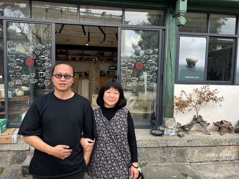 Deng Hucang and Su Geng run a workshop making and repairing pottery on the edge of Dali Old Town. Photograph: Denis Staunton