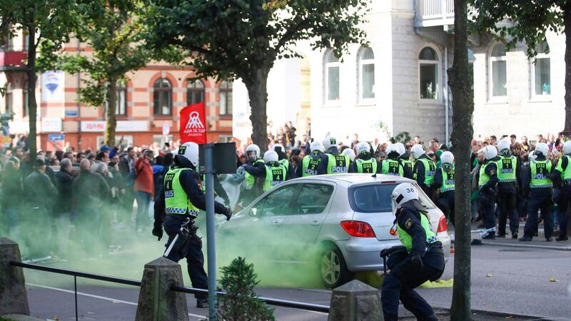 Counter-demonstrators protest in front of police prior to the far-right Nordic Resistance Movement march in Gothenburg, Sweden. Photograph: Adam Ihse/AFP/Getty Images