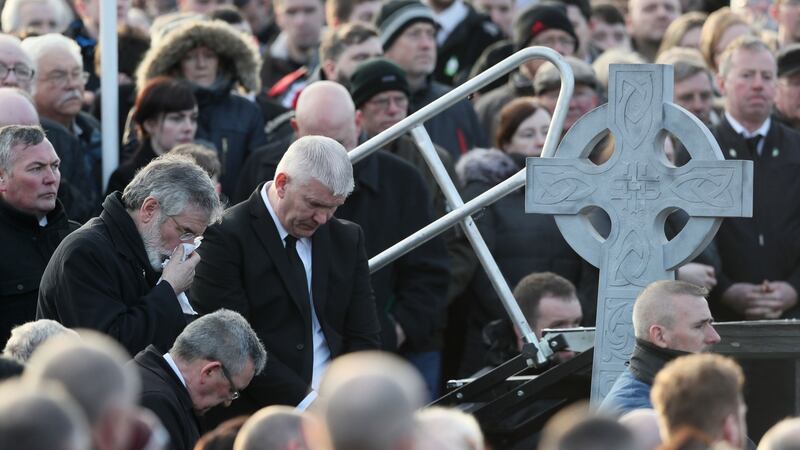 Mourners, including Gerry Adams, arrive at Derry City Cemetery in Derry, following the funeral service of Northern Ireland’s former deputy first minister and ex-IRA commander Martin McGuinness. Photograph: Brian Lawless/PA Wire