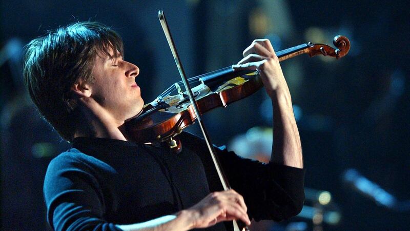 Joshua Bell: playing the NCH with Academy of St Martin in the Fields.  Photograph: Kevork Djansezian/AP