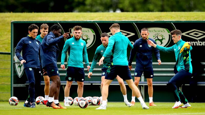 Assistant manager Keith Andrews, Festy Ebosele, Ryan Manning, Alan Browne, Conor Hourihane and Darragh Lenihan at the Republic of Ireland squad training session in Abbotstown, Dublin. Photograph: Ryan Byrne/Inpho 