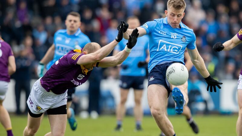 Dublin’s Seán Bugler with Kevin O’Grady of Wexford. Photograph: Morgan Treacy/Inpho