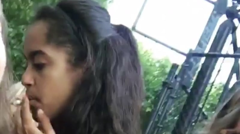 Malia Obama allegedly smoking a cannabis joint at Lollapalooza music festival in Chicago last week. Photograph: Radar Online