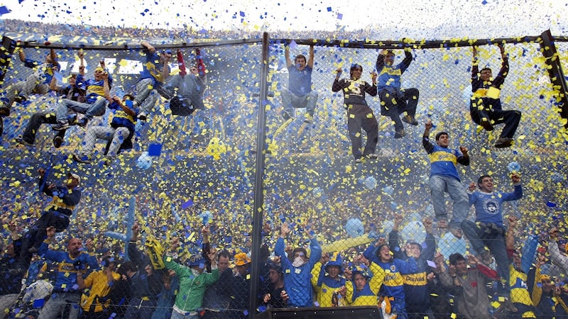 Boca Juniors fans can’t contain their excitement during a 2014 match against River Plate in Buenos Aires. Photograph: Daniel/AFP/Getty Images