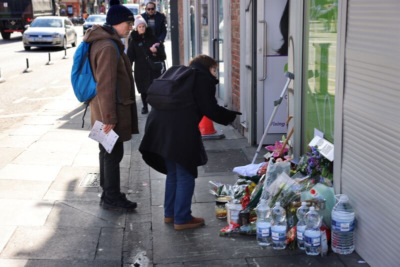 Tributes and flowers left to the late Ann Delaney at Aungier Street, Dublin. Photograph: Dara Mac Dónaill