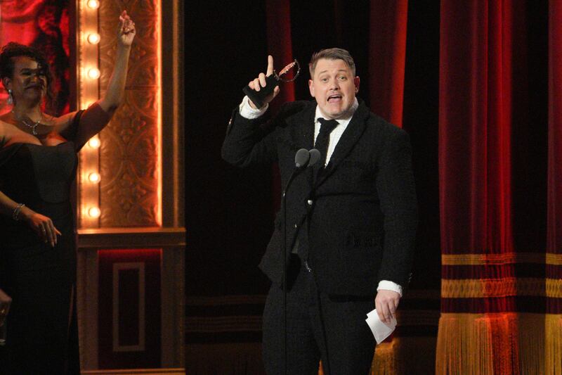 Michael Arden accepts the Tony Award for best direction of a musical for Parade. Photograph: Sara Krulwich/The New York Times